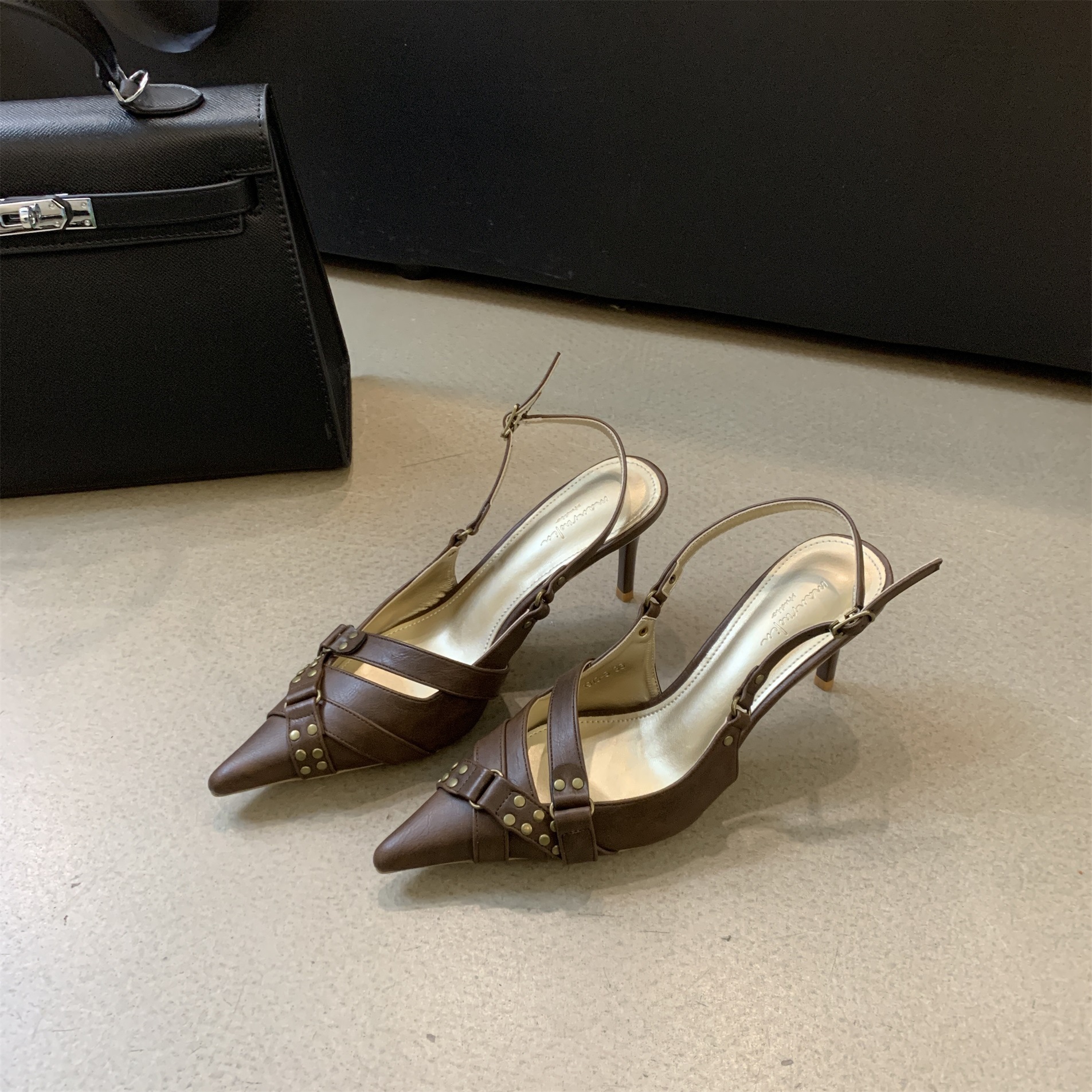 French black high heels, temperament women's shoes, niche shallow mouth pointed toe shoes 2024 summer rivet buckle sandals_voghion.com