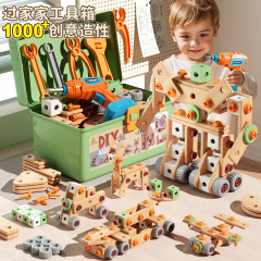 ねじをねじっておもちゃの子供の修理の道具箱の男の子の益智は手を動かして取り外して電気ドリルのドライバーの赤ちゃんを組み立てます。