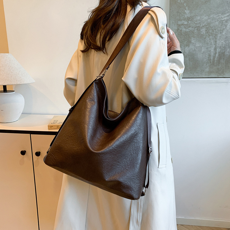 Retro gran capacidad versátil ins coreano de textura de viaje bolso de hombro para mujeres otoño y invierno 2024 nueva bolsa de mano