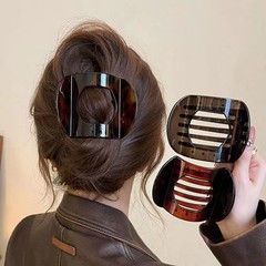 怠惰な古いお金の風は女性の秋冬の新型をつかみます。