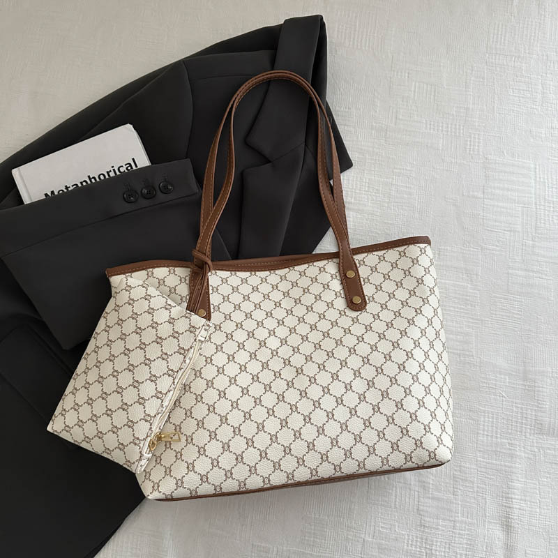Bolso de alta calidad de gran capacidad 2025 nuevo bolso de viaje de todo fósforo de nicho para mujer bolso de niño de moda para mujer bolso portátil para mujer