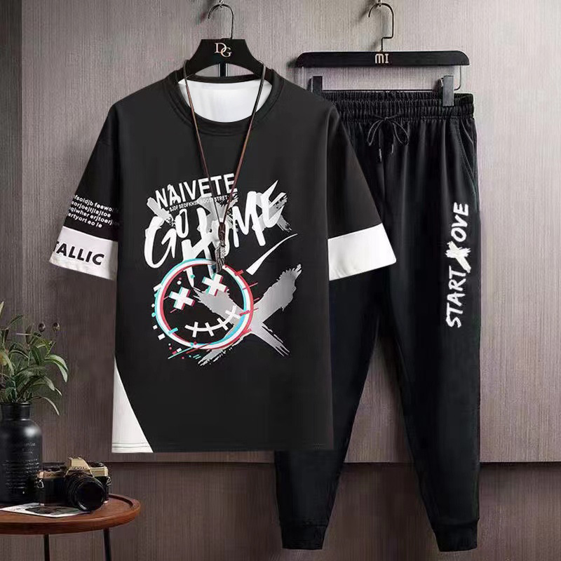 Hip hop Camiseta de manga corta de los hombres de verano de Hong Kong estilo media manga INS de moda todo fósforo camiseta casual pantalones cortos deportivos traje de dos piezas