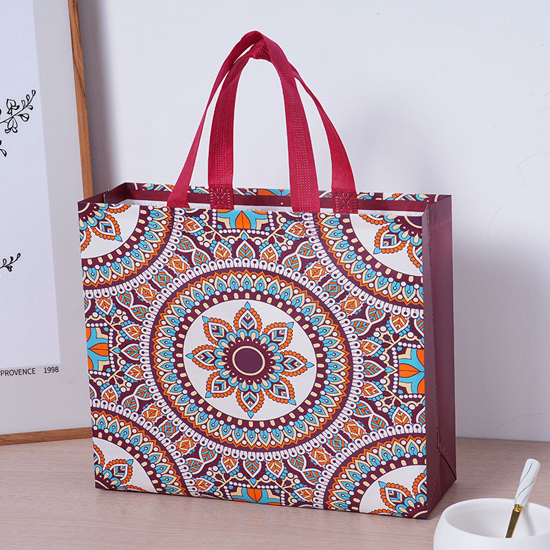 Bolsas de ropa de estilo nacional bolsas de mano de tela no tejida multicolor bolsas de embalaje personalizadas bolsas de mano de cosméticos mayoristas image 3