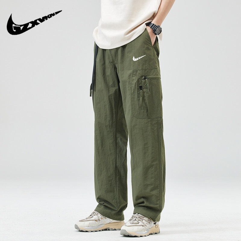 Men's new spring and autumn style outdoor sports pants, featuring a tapered leg, straight cut, and multiple pockets, suitable for both casual and workwear