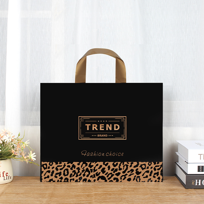 Tienda de ropa de suministro de fábrica bolso transparente logotipo impreso bolsa de embalaje de regalo bolsa de plástico de embalaje de ropa al por mayor