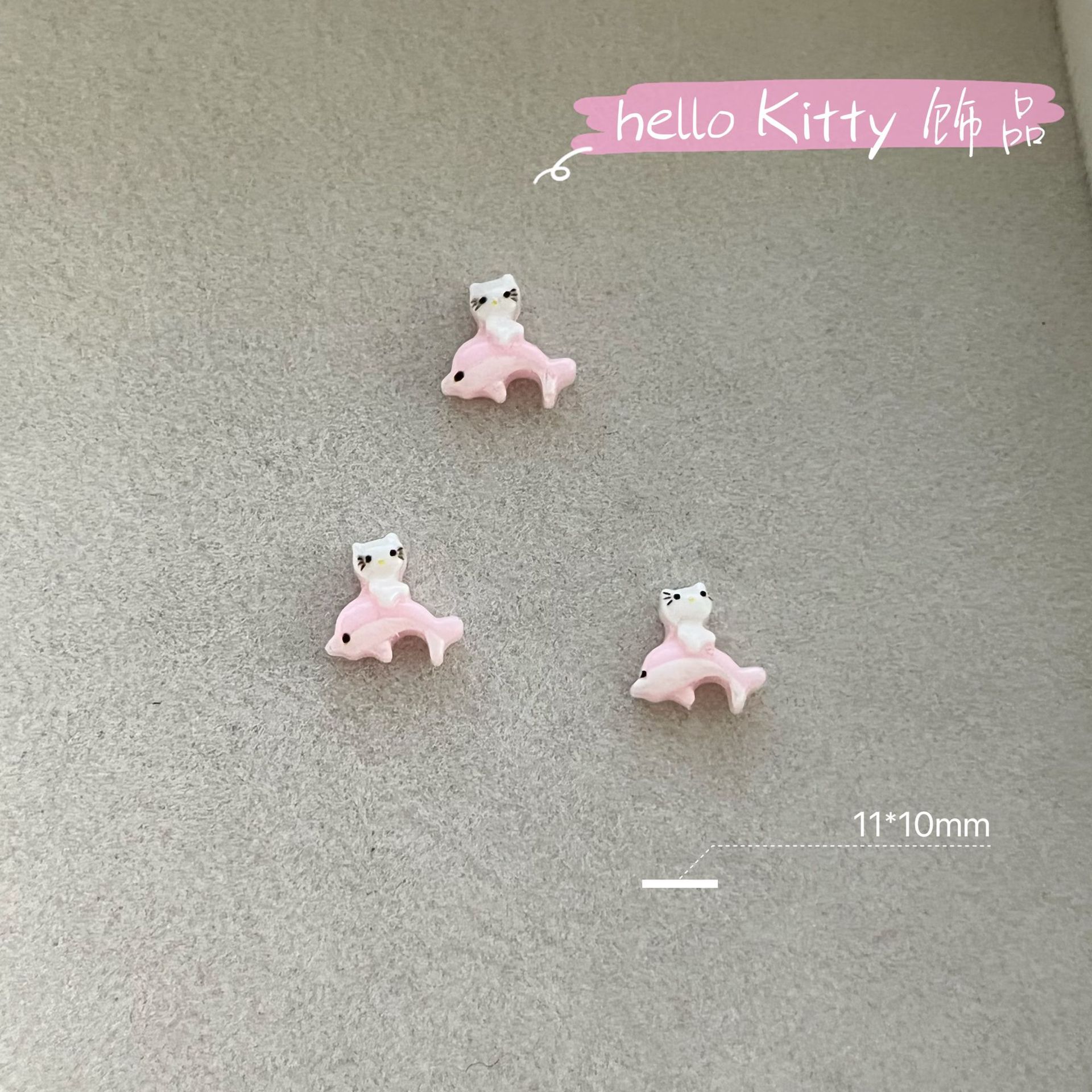 新商品のキティキャットの三麗鴎のネイルアクセサリーのネットの赤い爆発の樹脂のかわいいkt猫は甲を着て飾ります。