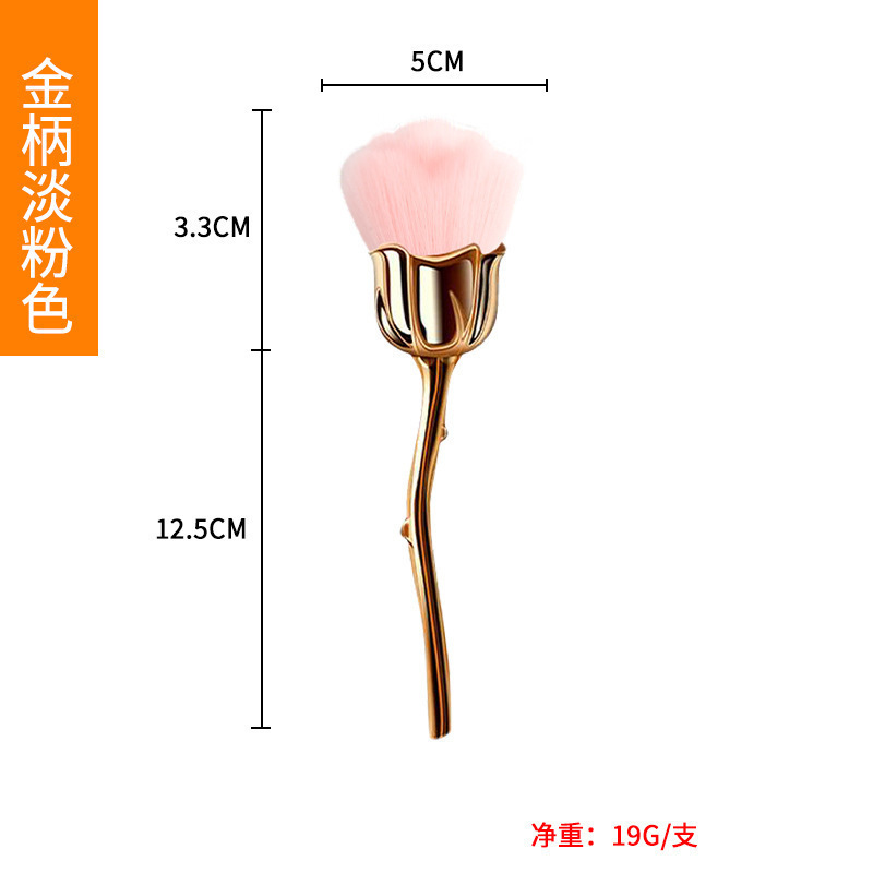 バラのばらの粉の化粧ブラシの化粧道具の爪の粉のほこりは頬紅のブラシを塗って化粧道具の現物を修理します。|undefined