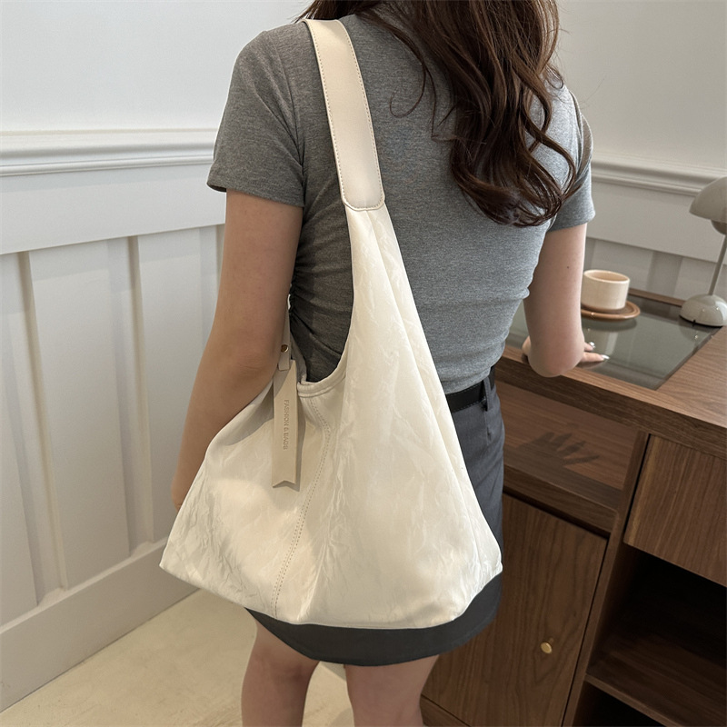Bolsa de estilo extranjero para mujeres, primavera y verano 2024, nueva bolsa de hombro de dama versátil, bolsa de estilo coreano de alta calidad para mujeres