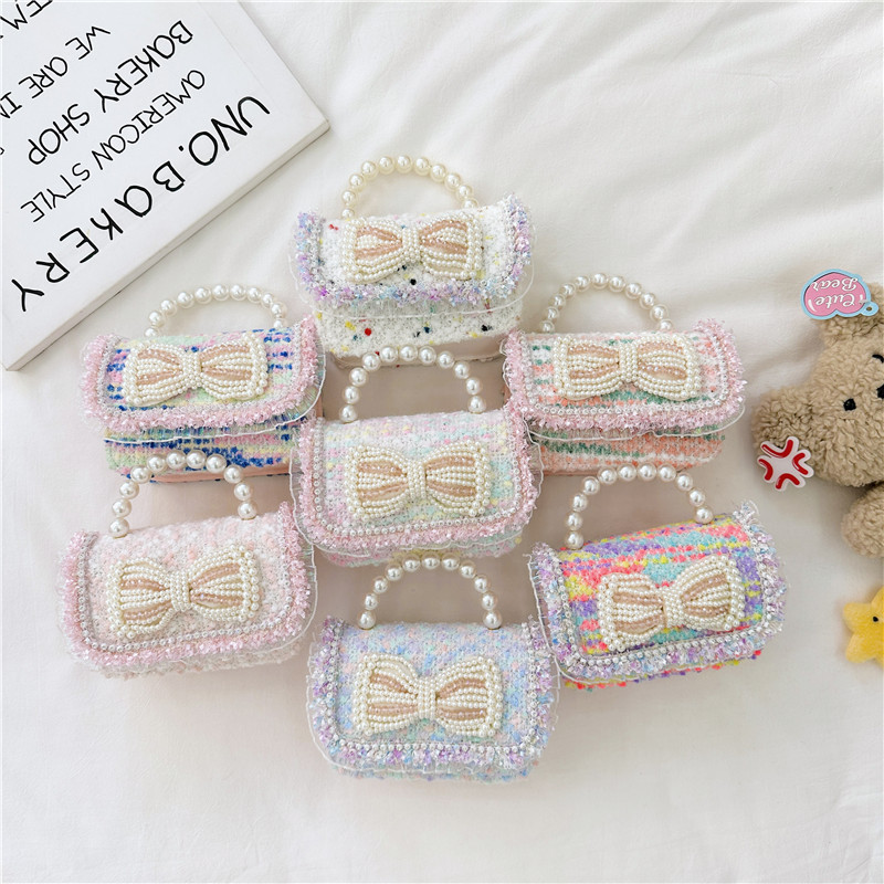 2025 otoño y invierno nuevo arco de perlas de arco de perlas bolsas de niños de tween lindas caricaturas princesa mochila