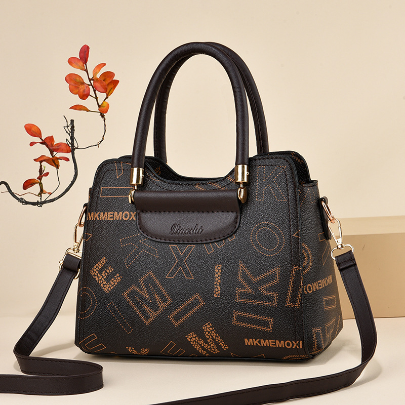 2024 fabricantes bolsos de mano de gran capacidad bolsos de mujer retro versátil bolsos de hombro texturas bolsos de tendencia