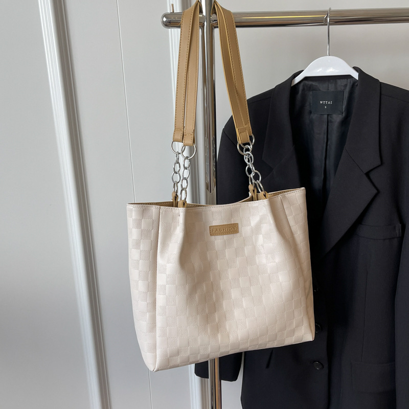 Bolsa de hombro a cuadrillas de alto nivel 2024, nueva bolsa de viaje simple de gran capacidad para estudiantes universitarios.