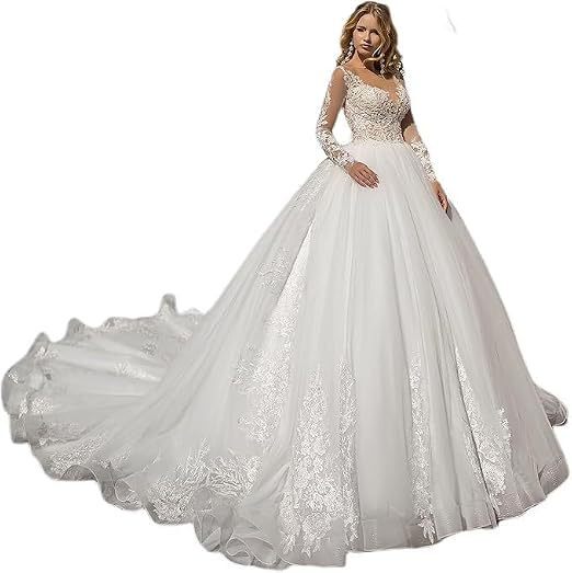 French-style long-sleeved lace wedding dress with a large train, elaborate appliques, and a puffy skirt that is slimming for the bride, suitable for a church wedding French-style long-sleeved lace wedding dress with a large train, elaborate appliques, and a puffy skirt that is slimming for the bride, suitable for a church wedding