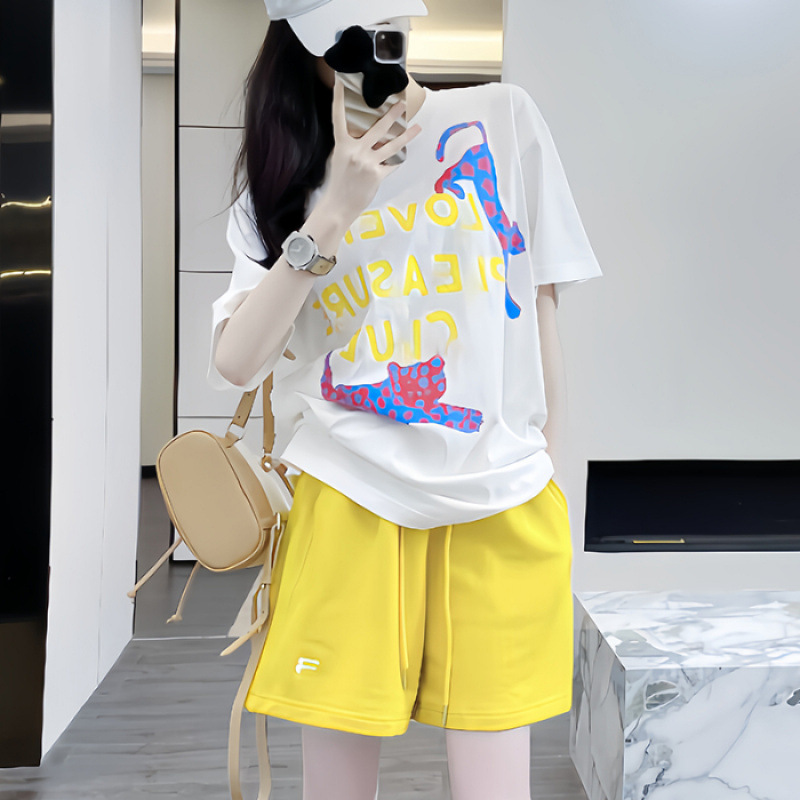 White top + yellow shorts