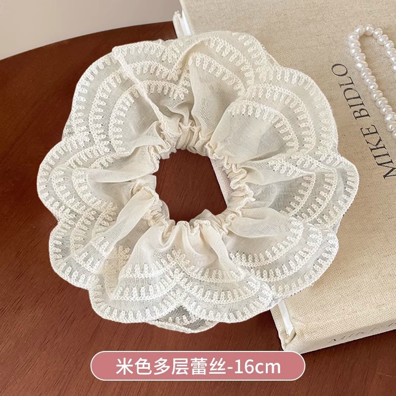 Coreano de encaje a cuadrícula anillo de cabello de intestino para mujeres 2026 nuevo estilo de cabello in-viento de gran tamaño bolas de cabello flor de tocado