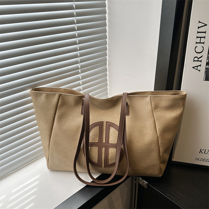 Bolso de mano de dama de alto nivel primavera y verano 2025 versátil bolso de viaje en bolsa popular de gran capacidad este año