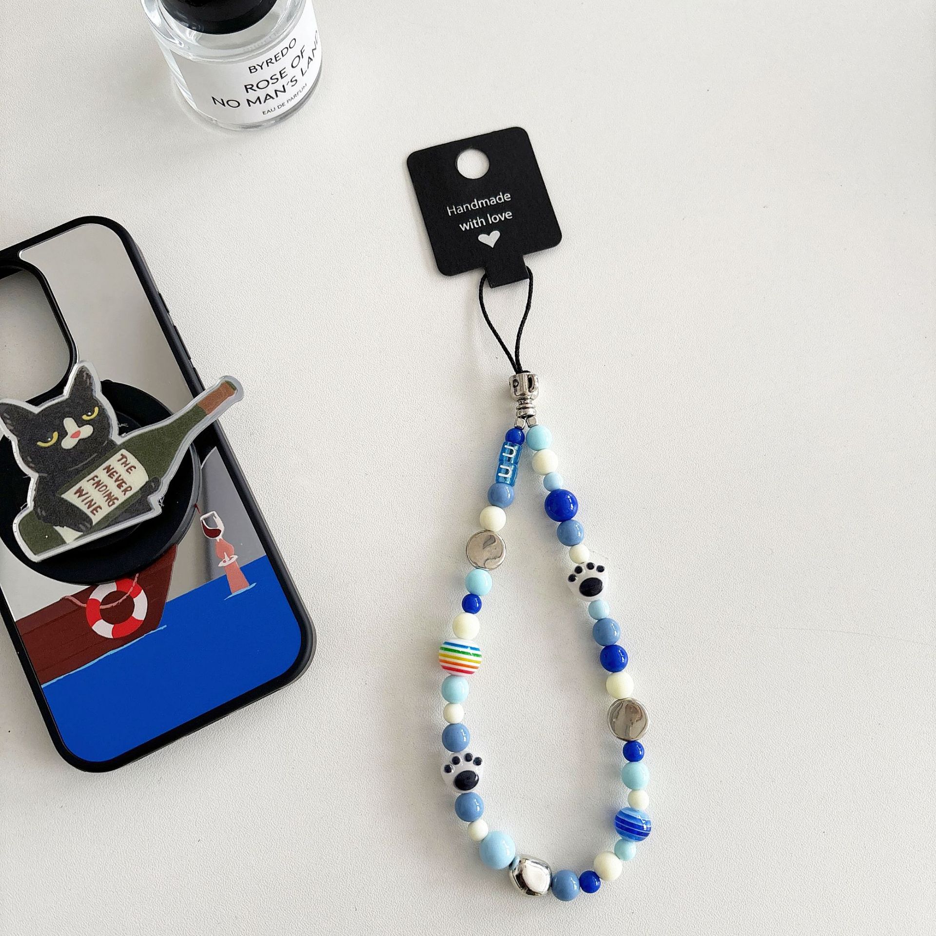 Cuentas de perlas hechas a mano, cadenas de teléfonos móviles, bolsos, colgantes, colgantes de muñeca, cuentas hechas a mano.