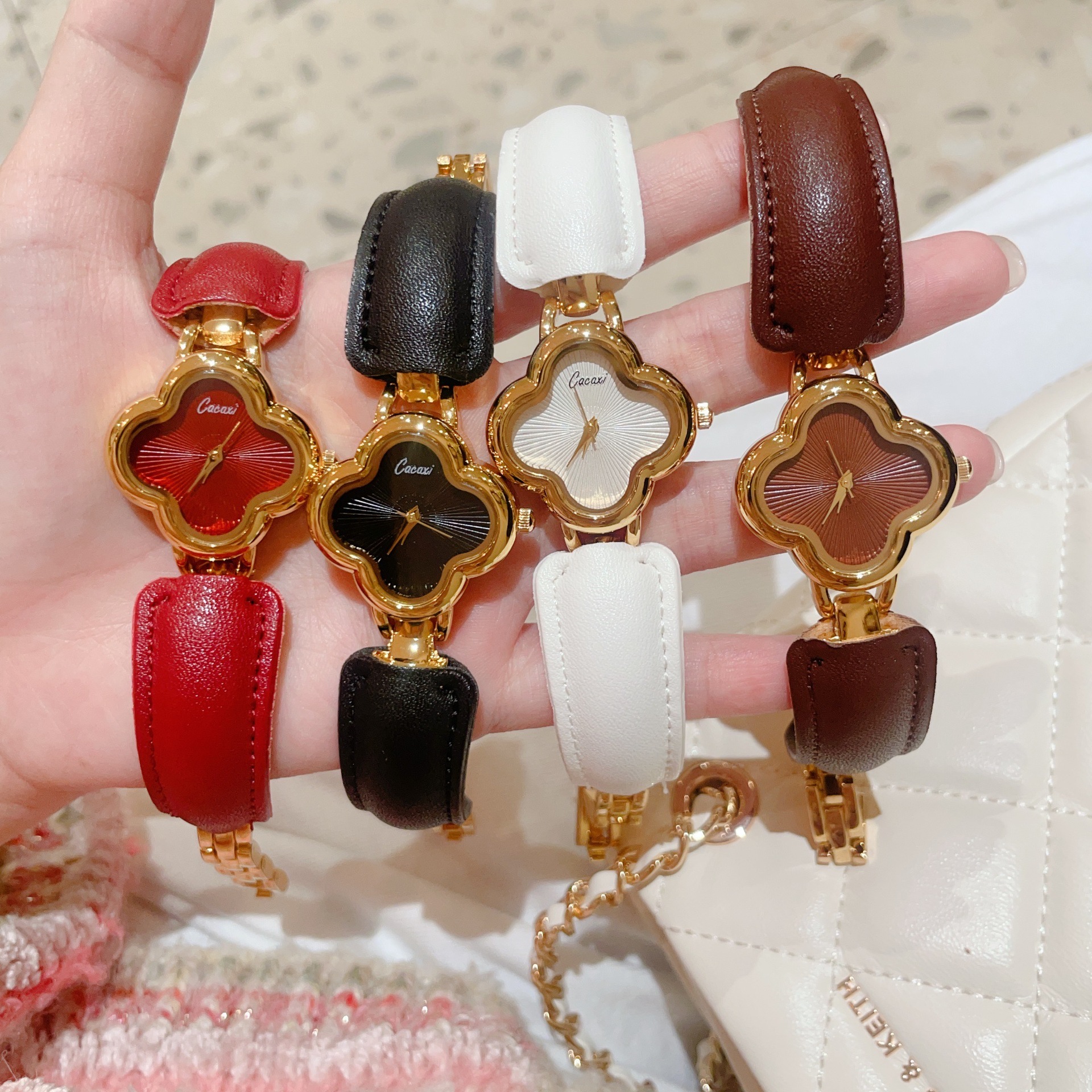 Cacaxi Fashion Light Luxury Four-Leaf Clover Small Fragrance Style Belt Bracelet Watch Women's Watch High-End Internet Celebrity Dropshipping
