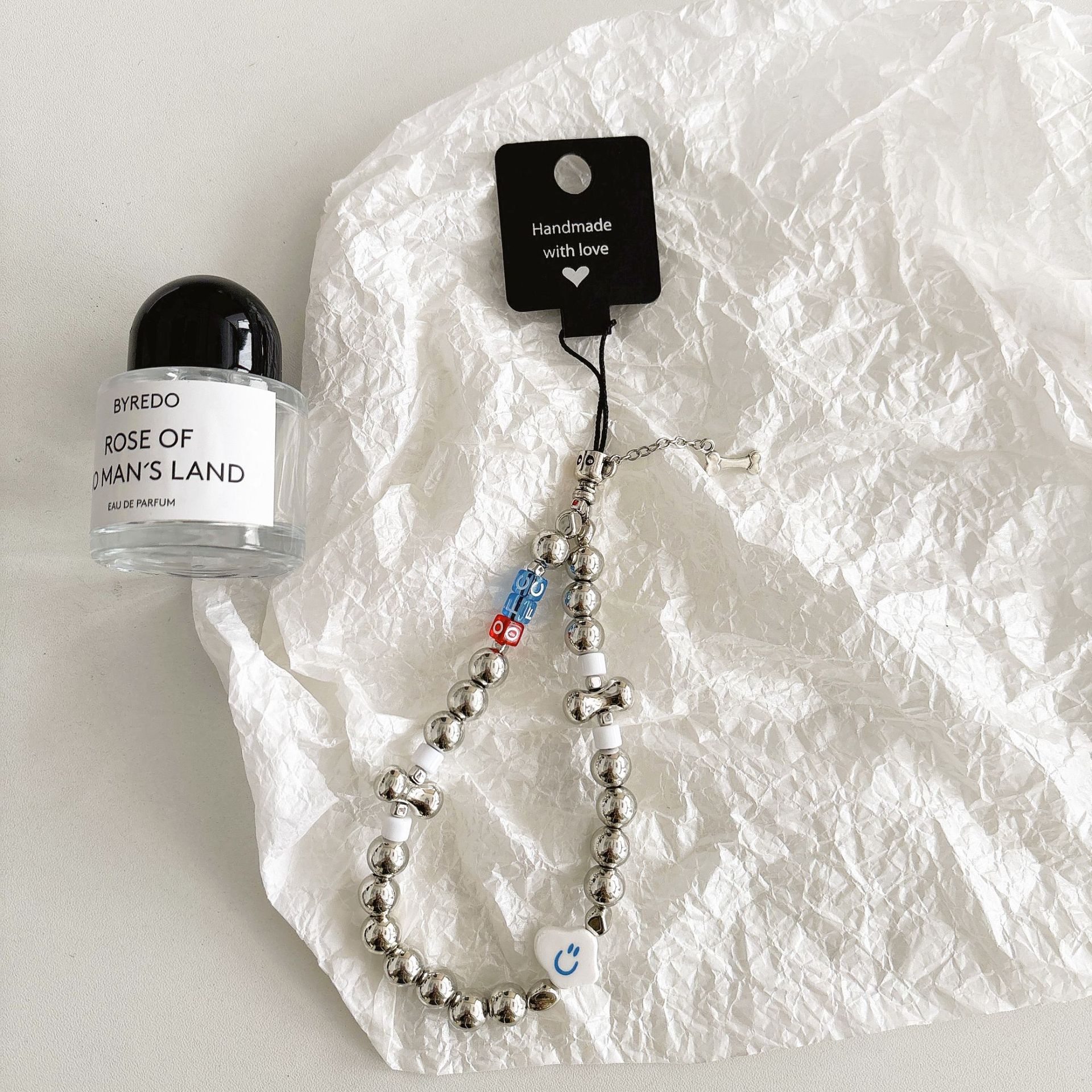 Cuentas de perlas hechas a mano, cadenas de teléfonos móviles, bolsos, colgantes, colgantes de muñeca, cuentas hechas a mano.