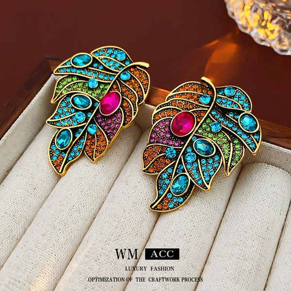 Silver needle inlaid diamond color leaf earrings