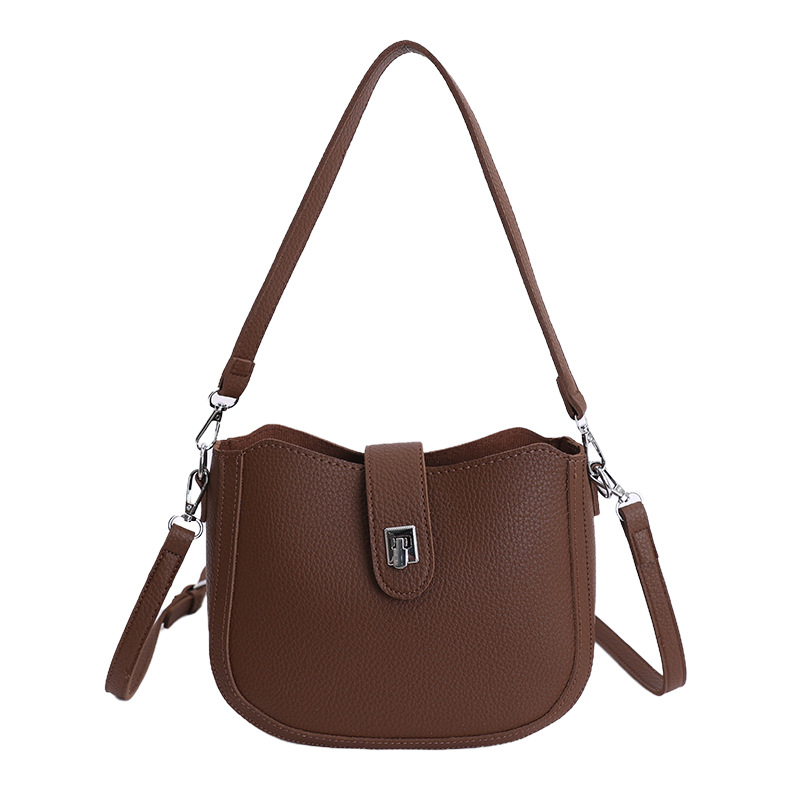 Hot sale nuevo nicho coreano litchi estampado bolso de cubo de hombro para mujeres sensación de lujo ligero versátil bolso de transporte de viaje