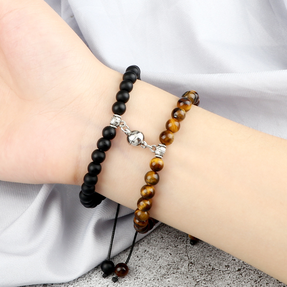 Paararmbänder ein Paar Freundinnen Perlen Nische geflochtenes Design Handseil runde Magnetschnalle Saugnapf Anhänger Armband Spot_voghion.com