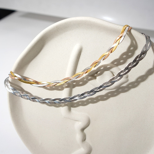 Women's designer handmade braided titanium steel necklace Women's new trendy European and American light luxury three-layer simple snake bone chain