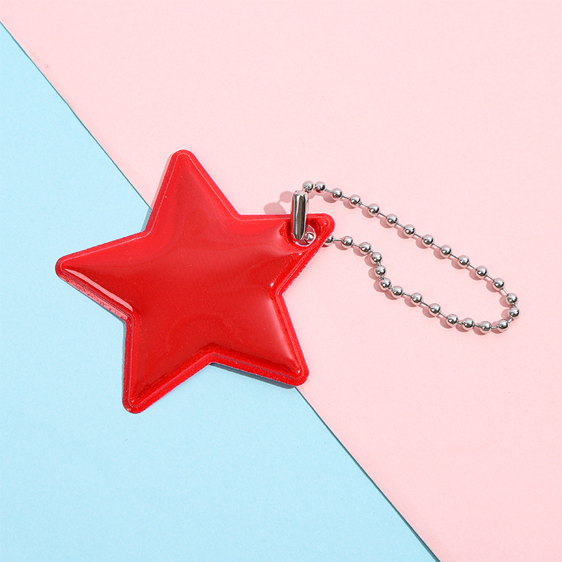 Llavero Colgante Reflectante de Estrella de PVC para Mochila Escolar y Ciclismo