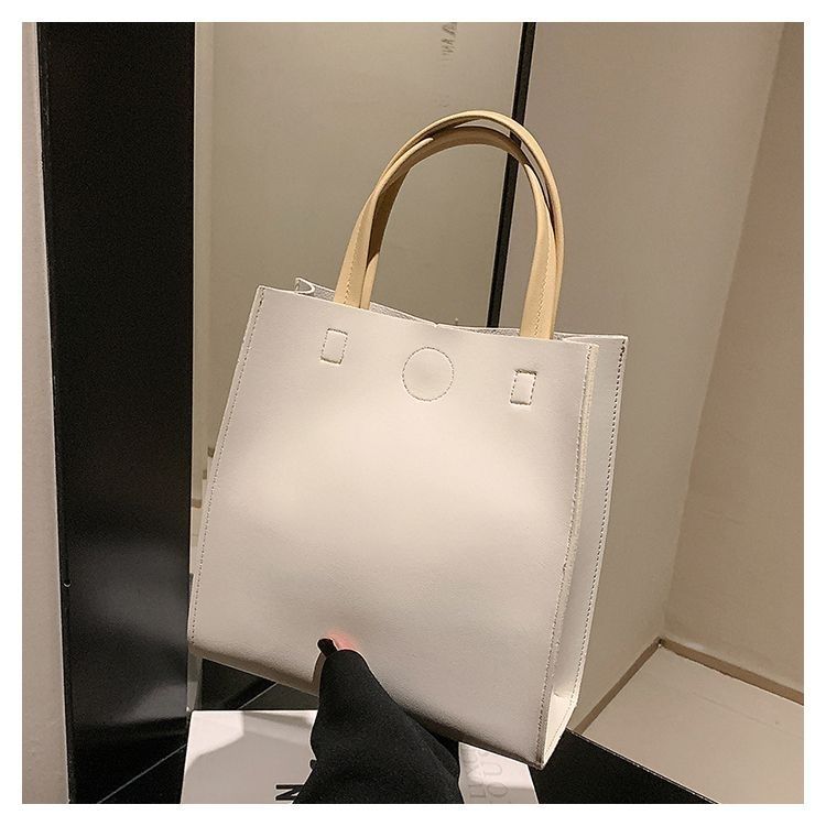 2024 New Bags Korean Version Versatile Commuting Bags Large Capacity Portable Tote Bag Temperament Popular Women’s Bag Vertical Style_voghion.com