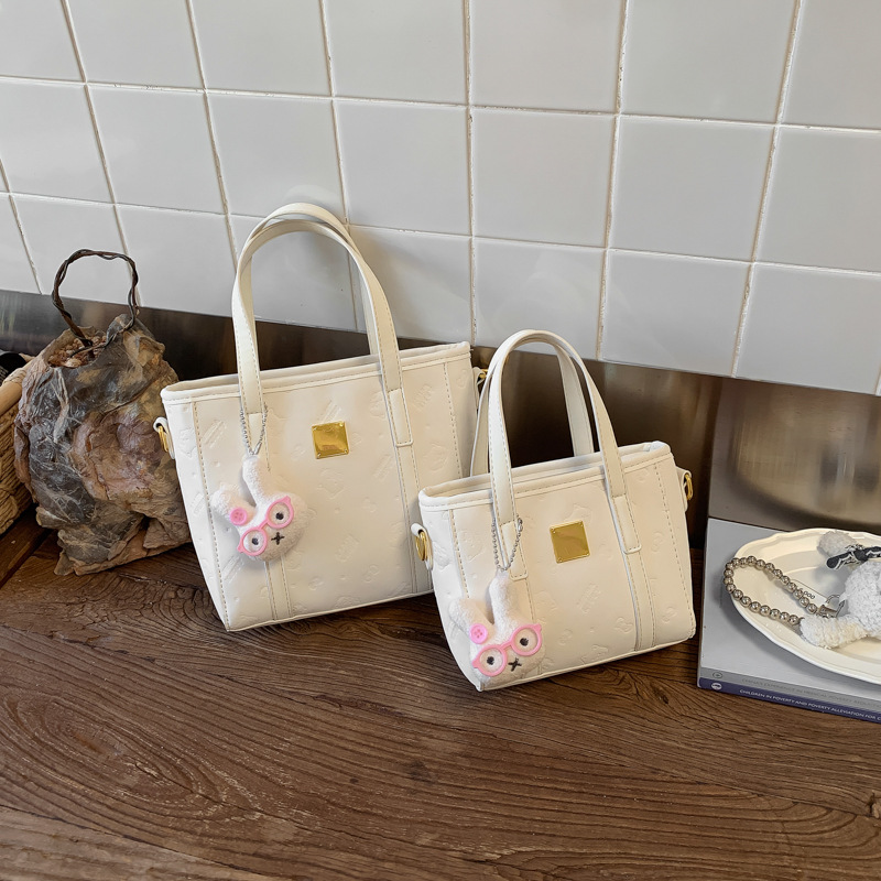 Borsa a secchiello in rilievo donna, elegante borsa a tracolla_voghion.com