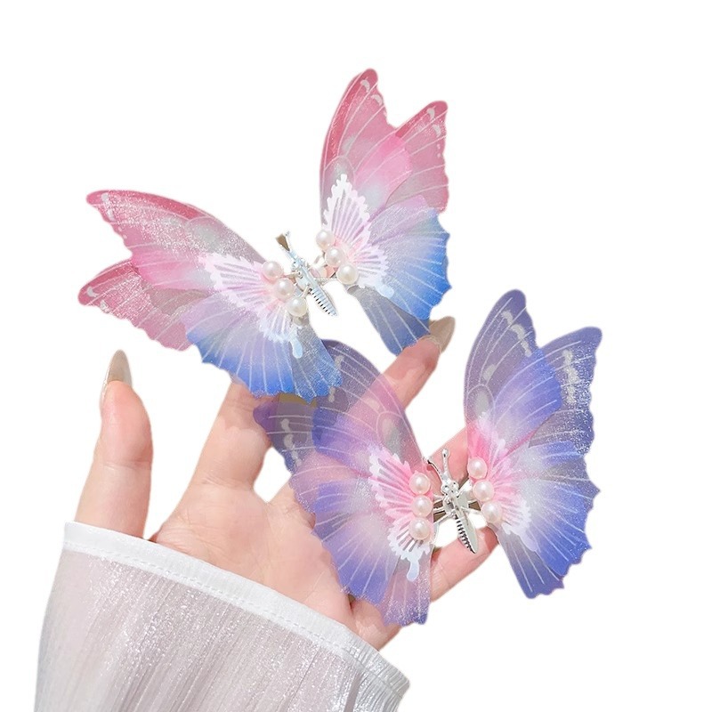 Clip de cabello de mariposa móvil ultra inmortal electrónica azul tulle perla clip de boca de pato decoración accesorios de playa clip tocado