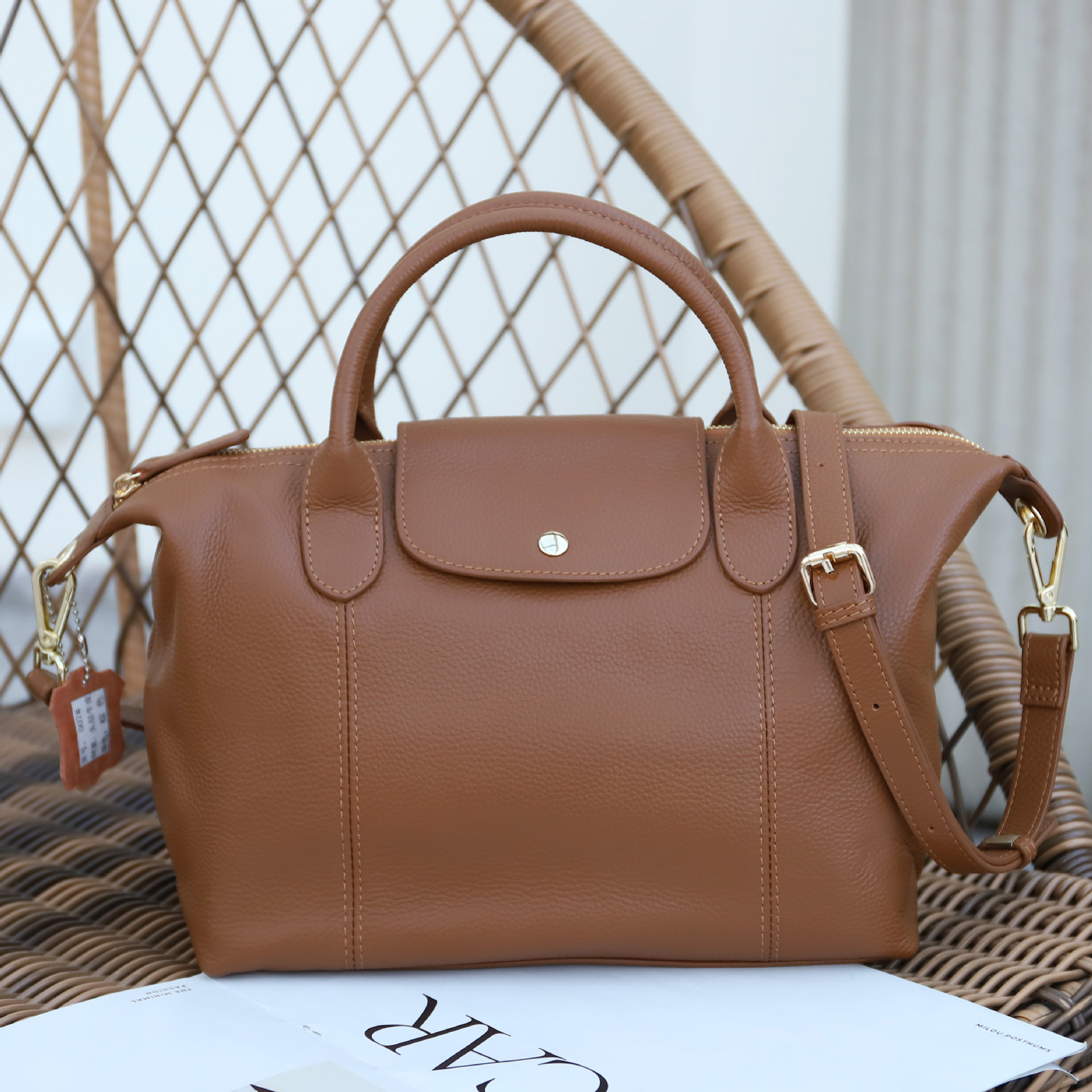 Nueva primera capa de piel de vaca de cuero de las mujeres de gran capacidad textura portátil simple todo-Partido de fábrica al por mayor bolsa de Boston