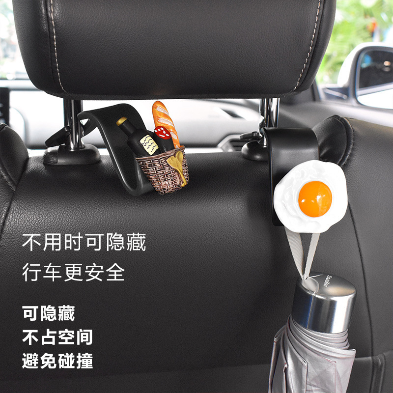 Gancho trasero del asiento del automóvil 2024 nuevo gancho pequeño multifuncional para automóvil lindo gancho para colgar en el automóvil de dibujos animados trasero