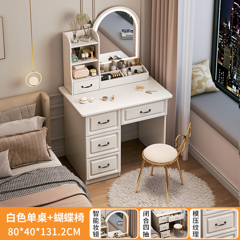 Luz y lujo de alta sensación de la mesa de maquillaje de la pequeña casa en una mesa dormitorio moderno simple con espejo mesa de maquillaje