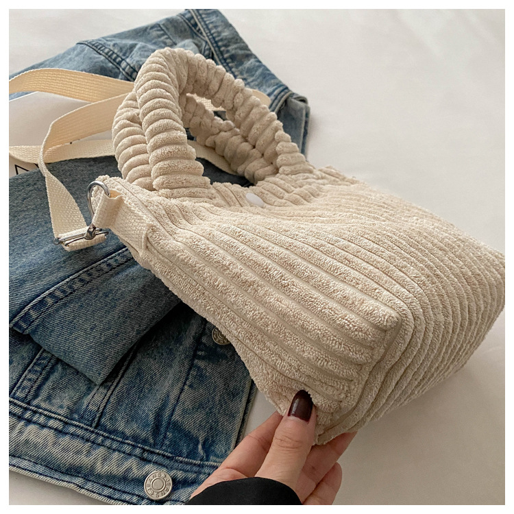 2025 New niche and fresh bucket bag, cute, fashionable and casual crossbody bag, versatile solid color handbag wholesale undefined