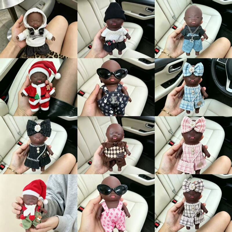 Hot-Selling Stress-Relief 14m Black-Skinned Doll with Clothes, Stress-Relief Doll Natasha, Available in Various Styles and Colors Hot-Selling Stress-Relief 14m Black-Skinned Doll with Clothes, Stress-Relief Doll Natasha, Available in Various Styles and Colors