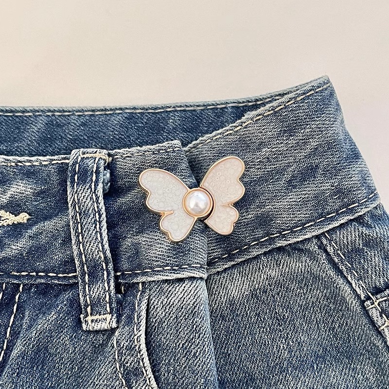 Botón de cintura de mariposa alta sensación jeans ajuste de cintura de botón fijo pantalones más grandes para reducir el pasador de hebilla sin costura