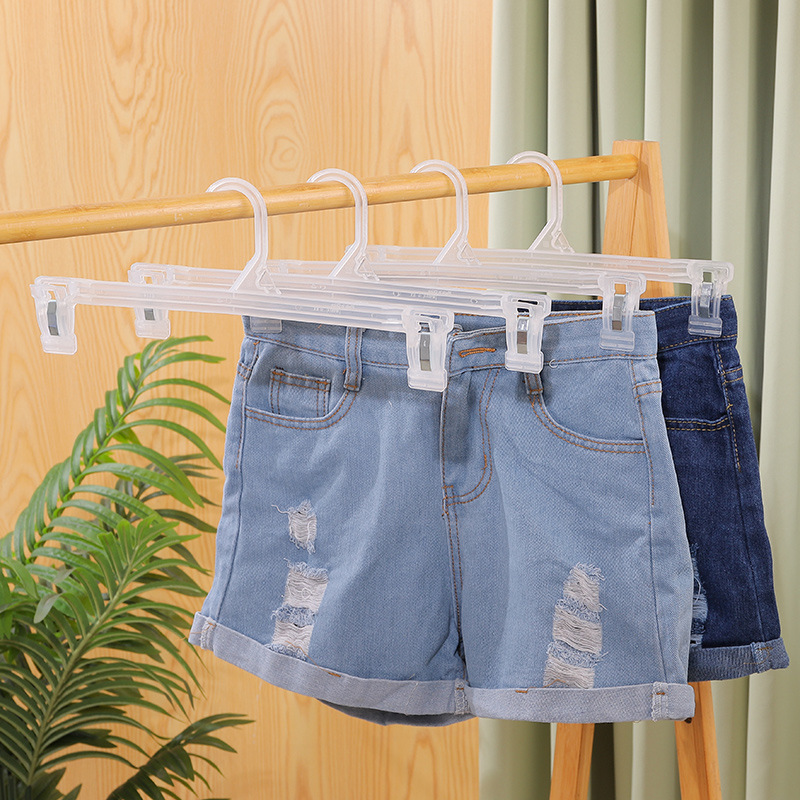 Percha de pantalones percha de pantalones de plástico clip percha de pantalones sin huellas exhibición de comercio exterior colgar gancho de gancho de gancho al por mayor