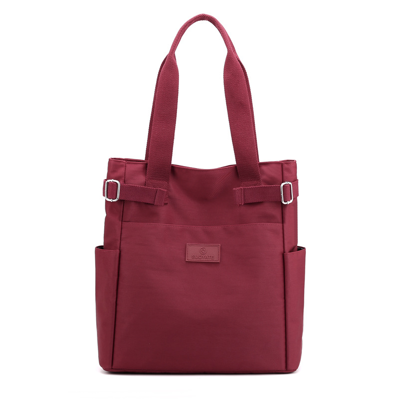 Nuevo bolso de hombro versátil de nailon para mujer, bolso de tela informal a la moda, bolso de lona para mujer, bolso de mano con gran capacidad