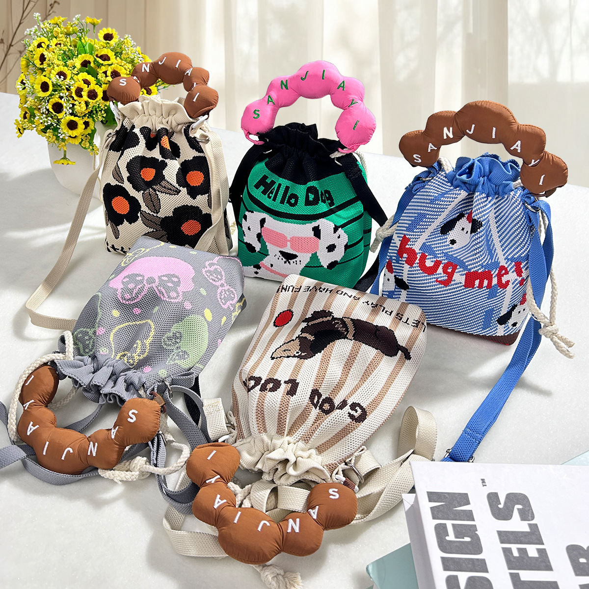 编织提花包包斜挎包女抽绳束口袋卡通针织毛线飞织迷你百搭手机包