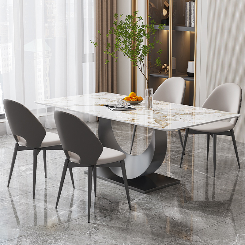 Luz de lujo de alta gama placa de roca rectangular mesa de comedor sala de estar moderna mesa de comedor de acero inoxidable simple combinación de mesa y silla