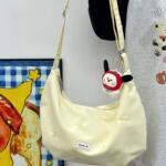 柔雾奶色清新蝴蝶结刺绣斜挎包女学生上课逛街通勤休闲百搭单肩包