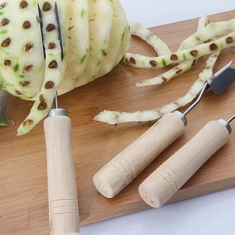 木柄パイナップルvシャベルステンレスパイナップルナイフ皮むき器パイナップルvシャベルパイナップルは目の神器パイナップルに行きます。|undefined