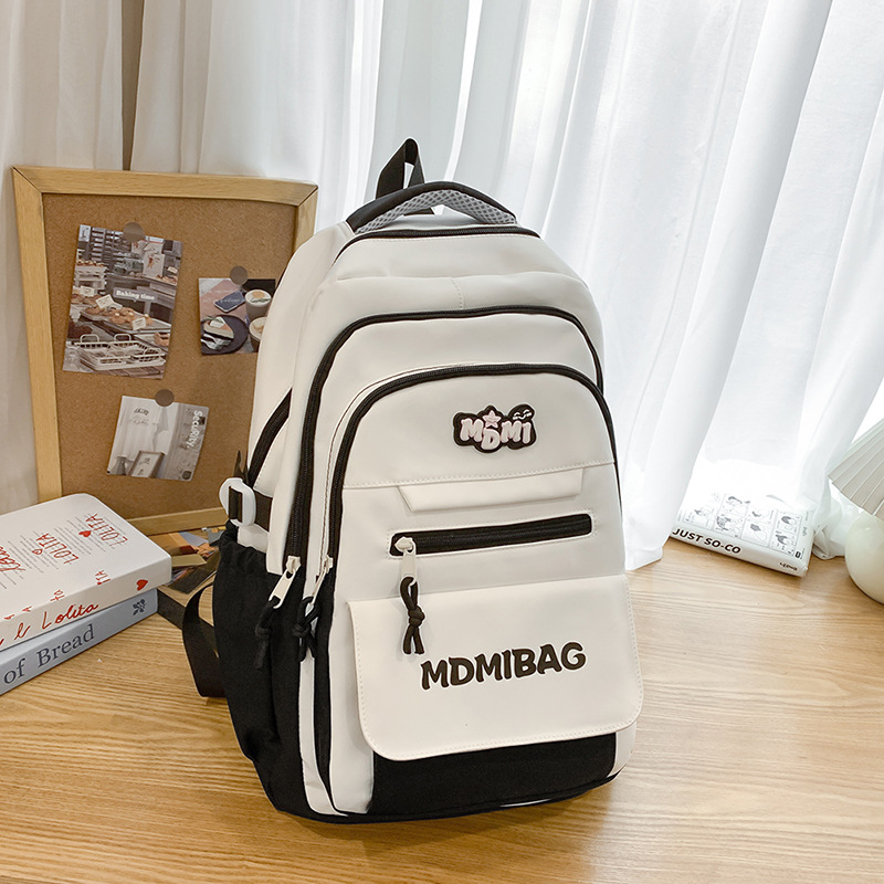 Mochilas escolares niñas de secundaria de alto valor facial nicho estilo insfeng estudiantes de secundaria de gran capacidad chocan con el color de los estudiantes de primaria para reducir la carga mochila