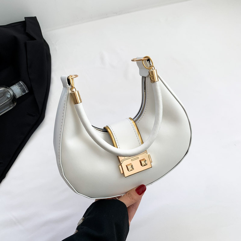 Bolso de axila simple y moderno 2024 nuevo diseño de nicho, estilo explosivo transfronterizo, bolso de luna nueva de un solo hombro de todo fósforo