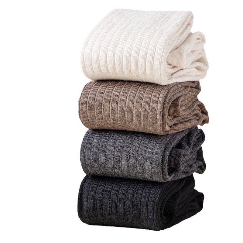 Calcetines de mujer Otoño e Invierno Nuevos calcetines altos color sólido Costura japonesa sobre la rodilla calcetines de pila casual fábrica a juego al por mayor