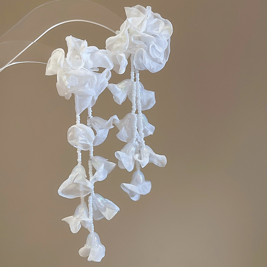 Pendientes de borla de flores de gasa de aguja de plata Pendientes de dopamina de bosque dulce Pendientes de todo fósforo de tendencia de nicho Mujeres al por mayor