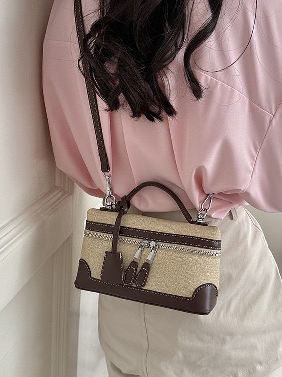 Caja de mano retro europea y americana bolsos pequeños cuadrados de mujeres nuevas ventas calientes transfronterizas pu color de empalme de hombro único bolso de tramo inclinado
