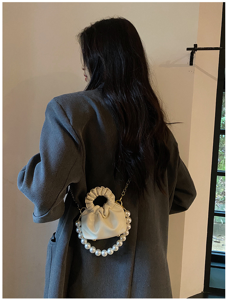 255g Weight Beading, Pearls Fashion Element Clasp Frame Closure Type Top Handle, Chain Strap Type Crossbody Bag Bags Type Casual, Daily, Shopping Occasion Pu Leather Material Solid Color Pattern All Seasons Season Kid'S Gender Cute Style Bucket Shape Kid'S Pu Leather Solid Color Cute Beading Pearls Bucket Clasp Frame Crossbody Bag 61