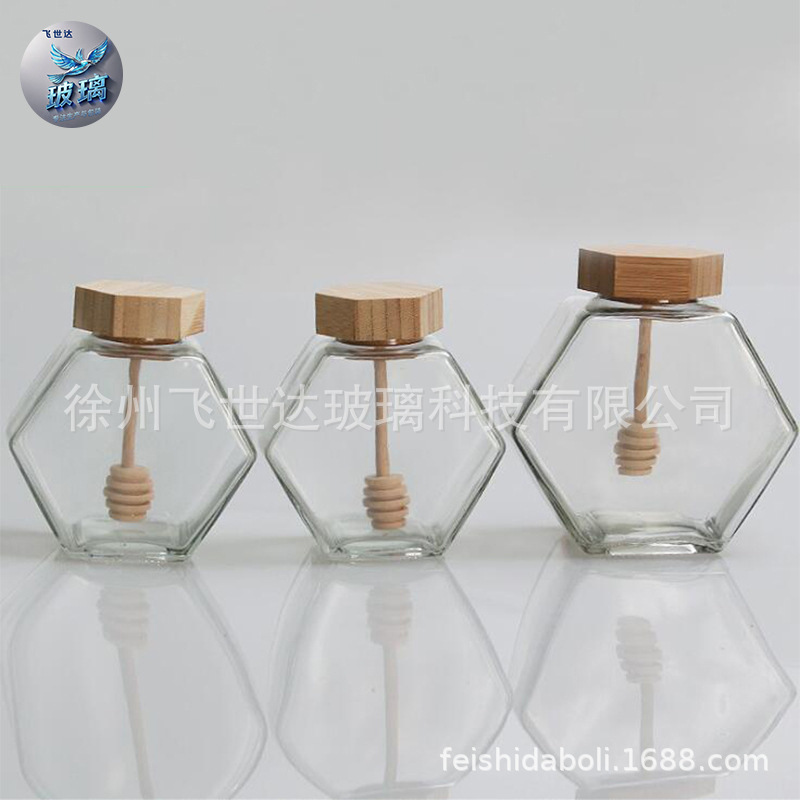 跨境批发扁六棱蜂蜜玻璃瓶木盖带搅拌棒 家用六角铁盖果酱分装瓶
