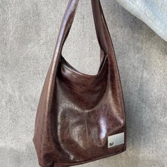 高級感バッグ女性レトロソフト皮大容量腋の下バッグ2025新型通勤シングルバッグ